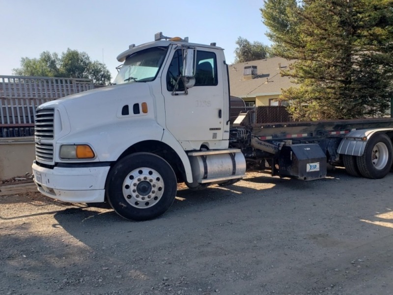 2000 Sterling T/A Roll Off Truck